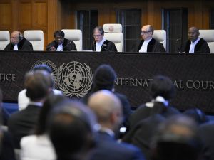 President of the International Court of Justice (ICJ) Yuji Iwasawa (C) and members issue first Advisory Opinion (AO) on States' legal obligations to address climate change, in The Hague on July 23, 2025. AFP ICJ rebukes Israel over Gaza aid restrictions amid deepening humanitarian crisis
