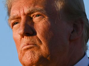 Former US President and Republican presidential candidate Donald Trump looks on during a campaign rally at site of his first assassination attempt in Butler, Pennsylvania on October 5, 2024. (Photo by Jim WATSON / AFP) Behind the Gaza agreement: Trump offers personal guarantees to Hamas