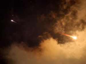 Rocket trails are seen in the sky above the Israeli coastal city of Netanya amid a fresh barrage of Iranian missile attacks on June 21, 2025. Israel's war with Iran entered its second week with the Israeli military chief warning of a "prolonged campaign" and Tehran ruling out further nuclear talks with the United States until Israel halts its attacks. (Photo by JACK GUEZ / AFP) Revealed: The IRGC commander orchestrating global attacks on Israeli targets