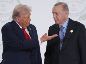 US President Donald Trump greets Turkish President Recep Tayyip Erdogan during a summit on Gaza in Sharm el-Sheikh on October 13, 2025. Trump landed in Egypt on October 13 for a summit on Gaza, following a lightning visit to Israel after a ceasefire he brokered entered into force. Israel faces "Nightmare Scenario" as Erdogan secures role in postwar Gaza