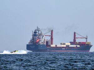 Cargo ship hit near Strait of Hormuz as Iran-Oman shipping dispute escalates