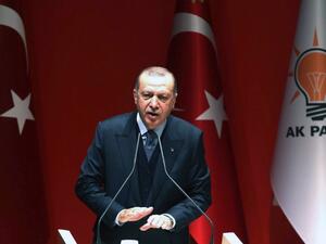 Turkey's President and leader of the Justice and Development Party (AKP) Recep Tayyip Erdogan delivers a speech during the AKP's extended meeting of provincial heads at the party's headquarters in Ankara on Feb. 23, 2018. 
(ADEM ALTAN / AFP)