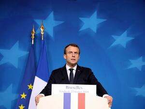 (FILES) French President Emmanuel Macron gestures as he addresses a press conference at the end of the European Council summit in Brussels on Feb. 23, 2018. 
(Ludovic MARIN / AFP)