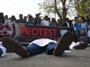 Pakistani students stage a protest against the ongoing conflict in Syria, in Lahore on Mar. 2, 2018. More than 340,000 people have been killed across Syria since its civil war started in 2011 with the brutal repression of anti-government protests.
(ARIF ALI / AFP)