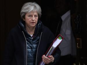 Britain's Prime Minister Theresa May leaves 10 Downing street for the weekly Prime Minister Question (PMQ) session in the House of Commons in London on Mar.14, 2018. 
(Daniel LEAL-OLIVAS / AFP)