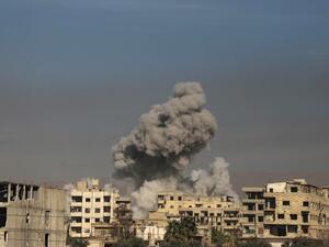 A general view shows smoke billowing in Hazeh, in the rebel enclave of Eastern Ghouta on the outskirts of Damascus on Mar. 15, 2018 during reported shelling by Syrian government forces. Seven years of conflict in Syria have left more than 350,000 people dead, according to an updated overall death toll released today by the Syrian Observatory for Human Rights.
(AMER ALMOHIBANY / AFP)