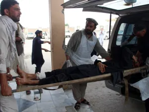A wounded Afghan lies on trolley as he is rushed to hospital following a blast (AFP/File Photo)	