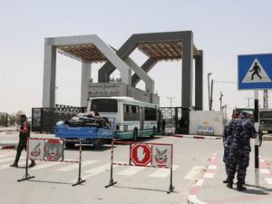 Palestinians wait to travel to Egypt through the Rafah border crossing, in the southern Gaza Strip, on May 18, 2018. Egyptian President Abdel Fattah al-Sisi has made a rare decision to open the Rafah crossing with Gaza for a month, allowing Palestinians to cross during the holy period of Ramadan. The decision to keep the crossing open was taken "to alleviate the suffering" of residents in the Palestinian enclave, Sisi said on Facebook late on May 17. (SAID KHATIB / AFP)
