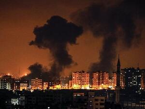 A picture taken on August 8, 2018 in Gaza City shows smoke plumes rising following an Israeli air strike (AFP/ MAHMUD HAMS)