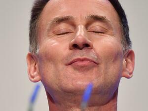 Britain's Foreign Secretary Jeremy Hunt gives a speech in the main hall on the first day of the Conservative Party Conference 2018 at the International Convention Centre in Birmingham, on September 30, 2018. 
Ben STANSALL / AFP