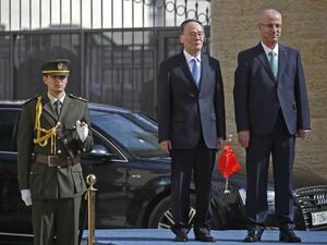 Chinese Vice President Wang Qishan and Palestinian prime minister Rami Hamdallah review the honour guard in the the West Bank city of Ramallah on October 23, 2018. 
ABBAS MOMANI / POOL / AFP Chinese Vice President Wang Qishan and Palestinian prime minister Rami Hamdallah review the honour guard in the the West Bank city of Ramallah on October 23, 2018. 
ABBAS MOMANI / POOL / AFP