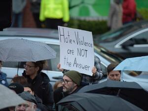 People gather for a vigil in Squirrel Hill, Pennsylvania on October 27, 2018, to remember those that died in the Tree of Life Synagogue shooting earlier in the day (AFP)