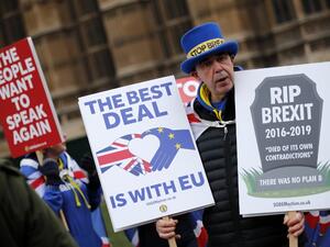 Anti-Brexit campaigner Steve Bray holds pro-EU placards as he demonstrates outside the Houses of Parliament in central London on January 21, 2019. (AFP/ File)