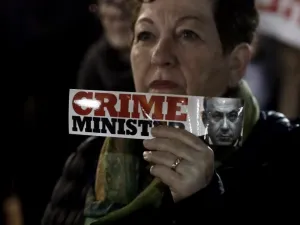 Israeli protesters participated in a march demanding that Israeli Prime Minister Benjamin Netanyahu resign over corruption allegations (AFP)