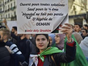 Algerian students demonstrate in the centre of the capital Algiers on March 12, 2019, one day after President Abdelaziz Bouteflika announced his withdrawal. (AFP/ File Photo)