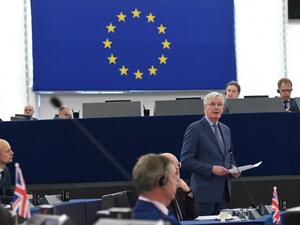 European Union's chief Brexit negotiator Michel Barnier (R) speaks during a debate on the preparation of the upcoming European Council meeting of March 21 and 22 and UK’s withdrawal from the EU. (AFP)