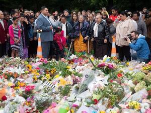 A Samoan church choir sings in tribute to the victims of the massacre that happened at Christchruch (AFP/MARTY MELVILLE)