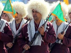 Turkmen Basij militiamen take part in an annual military parade marking the Iran-Iraq war, in the Iranian capital Tehran. (AFP/File Photo)
