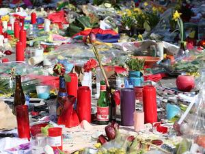 Flowers and candles are laid in a makeshift memorial on the Place de la Bourse (Beursplein) in central Brussels, on March 27, 2016, in tribute to the victims of the coordinated terror attacks in the city claimed by Daesh on March 22, in which 31 people were killed and over 300 injured. (AFP/Nicolas Maeterlinck) Flowers and candles are laid in a makeshift memorial on the Place de la Bourse (Beursplein) in central Brussels, on March 27, 2016, in tribute to the victims of the coordinated terror attacks in the city claimed by Daesh on March 22, in which 31 people were killed and over 300 injured. (AFP/Nicolas Maeterlinck)