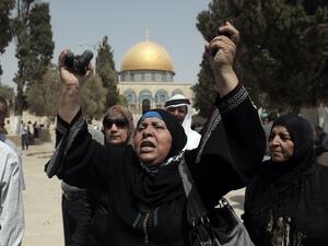 A Palestinian woman shows rubber bullets reportedly used by Israeli riot police outside the Dome of Rock at Al-Aqsa mosque in Jerusalem's Old City after clashes erupted at the compound between Palestinians and Israeli police on September 13, 2015, just hours before the start of the Jewish New Year. (AFP/Ahmad Gharabli) A Palestinian woman shows rubber bullets reportedly used by Israeli riot police outside the Dome of Rock at Al-Aqsa mosque in Jerusalem's Old City after clashes erupted at the compound between Palestinians and Israeli police on September 13, 2015, just hours before the start of the Jewish New Year. (AFP/Ahmad Gharabli)
