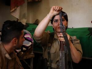 Iranian Kurdish Peshmerga members of the Iranian Kurdistan Democratic Party (KDP-Iran) clean their weapons during routine military exercise in Koya, 100 kms north of Arbil, the capital of the autonomous Kurdish region of northern Iraq, on August 23, 2017. (AFP)