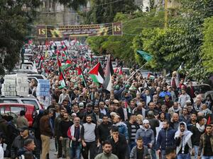 Palestinian and Lebanese protesters take to the streets in the Lebanese capital Beirut on Dec. 8, 2017, to denounce the widely criticized decision by U.S. President Trump to recognize Jerusalem as the capital of Israel (ANWAR AMRO/AFP)