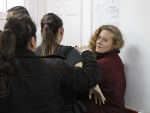 Palestinian Ahed Tamimi (R), 17, a well-known campaigner against Israel's occupation, appears at a military court at the Israeli-run Ofer prison in the West Bank village of Betunia on Dec. 20, 2017 (Ahmad GHARABLI/AFP)