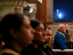 Egyptians gather during the funeral of the victims of the attack on the Saint Mina Coptic church, on Dec. 29, 2017, at a church south of the capital Cairo.
(Samer ABDALLAH / AFP)