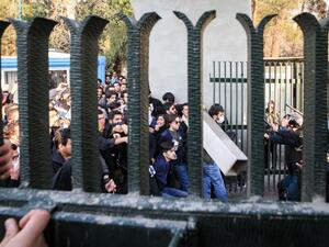 Iranian students scuffle with police at the University of Tehran during a demonstration driven by anger over economic problems, in the capital Tehran on Dec. 30, 2017 (STR/AFP)
