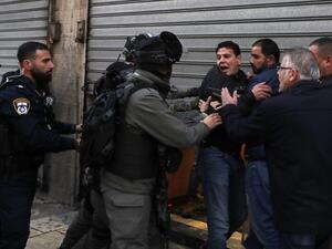 Israeli security forces scuffle with demonstrators in Jerusalem's Old City on Jan. 6, 2018, as protests continue in the region amid anger over U.S. President Donald Trump's recognition of Jerusalem as its capital (AFP)