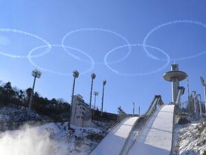 In a photo taken on Jan. 10, 2018 members of the South Korean air force Black Eagle aerobatic team perform above the ski jump venue of the Pyeongchang 2018 winter Olympics (YONHAP / AFP)