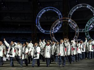 This file photo taken on Feb. 10, 2006 shows South Korean and North Korean athletes marching together during the opening ceremony of the 2006 Winter Olympics at the Olympic stadium in Turin (Eric Feferberg / AFP)