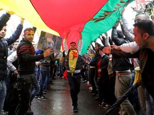Lebanese Kurds wave flags and chant slogans on Jan. 28, 2018, during a protest near the European Commission offices in Beirut against the ongoing Turkish military campaign in the Kurdish-held Syrian enclave of Afrin (ANWAR AMRO / AFP)