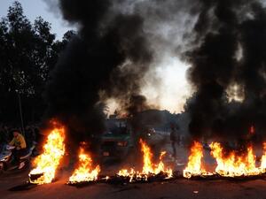 Supporters of Lebanon's Shiite Muslim parliament speaker burn tires to block a main road in Beirut on Jan. 29, 2018, following a row over a leaked video in which the foreign minister, a Maronite, called him a "thug" (ANWAR AMRO / AFP)
