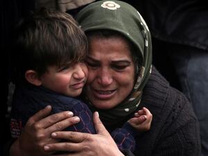 Syrian Kurds mourn in the northern town of Afrin during the funeral on Feb. 1, 2018 of fighters from the People's Protection Units (YPG) militia and the Women's Protection Units (YPJ), killed in clashes in the Kurdish enclave in northern Syria on the border with Turkey (DELIL SOULEIMAN / AFP)