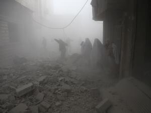 Syrian flee their homes following an airstrike in the rebel-held besieged town of Arbin, in the eastern Ghouta region on the outskirts of the capital Damascus on Feb. 2, 2018. 
(ABDULMONAM EASSA / AFP)