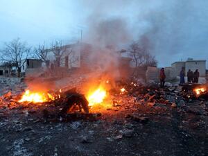 A picture taken on Feb. 3, 2018, shows smoke billowing from the site of a downed Sukhoi-25 fighter jet in Syria's northwest province of Idlib (OMAR HAJ KADOUR / AFP)