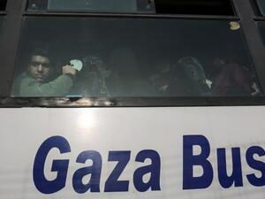 A Palestinian looks out of the window of a bus as travelers arrive at the Rafah border crossing in the southern Gaza Strip to cross into Egypt, after it was opened by Egyptian authorities for humanitarian cases on Feb. 7, 2018.
(SAID KHATIB / AFP) A Palestinian looks out of the window of a bus as travelers arrive at the Rafah border crossing in the southern Gaza Strip to cross into Egypt, after it was opened by Egyptian authorities for humanitarian cases on Feb. 7, 2018.
(SAID KHATIB / AFP)