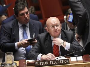 L-R) Deputy Russian Ambassador to the U.N. Vladimir Safronkov and Russian Ambassador to the U.N. Vasily Nebenzya  (AFP)