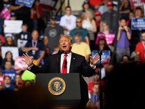 resident Donald J. Trump speaks to supporters (AFP)