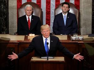U.S. President Donald J. Trump delivers the State of the Union address as U.S. Vice President Mike Pence (L) and Speaker of the House U.S. Rep. Paul Ryan (R-WI) (R) look on in the chamber of the U.S. House of Representatives Jan. 30, 2018 in Washington, DC (CHIP SOMODEVILLA / GETTY IMAGES NORTH AMERICA / AFP)
