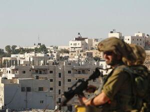 Israeli soldier looks on  (AFP/File Photo)