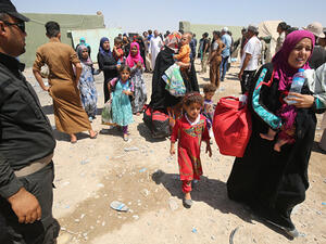 "The battle of Mosul is over, but for hundreds of thousands who fled the city, their suffering and despair continues," said the NRC's Iraq country director Heidi Diedrich (AFP/File)
