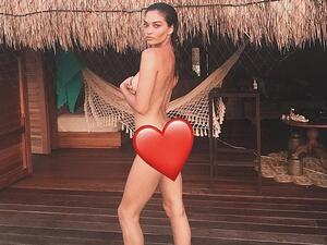 'It's not harming anybody': Victoria's Secret model Shanina Shaik, 28, (pictured) came under attack for her risqué nude to celebrate International Women's Day on Friday (Instagram)