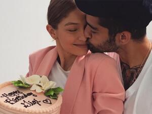 جيجي حديد وزين مالك (etonline.com)