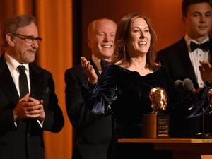 Kathleen Kennedy and Frank Marshall accept the Irving G. Thalberg Memorial Award from Steven Spielberg onstage during the Academy of Motion Picture Arts and Sciences’ 10th annual Governors Awards. (Source: AFP) Kathleen Kennedy and Frank Marshall accept the Irving G. Thalberg Memorial Award from Steven Spielberg onstage during the Academy of Motion Picture Arts and Sciences’ 10th annual Governors Awards. (Source: AFP)