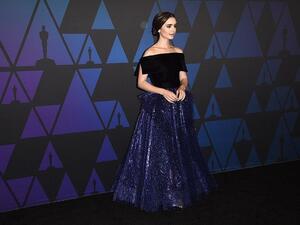 Lily Collins wore a gown by Georges Chakra. (Source: AFP) Lily Collins wore a gown by Georges Chakra. (Source: AFP)