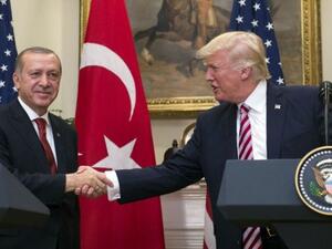  US President Donald Trump shakes hands with Turkish President Recep Tayyip Erdogan (AFP/File Photo)	