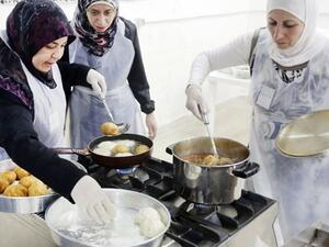 Telling the stories of Syrians displaced by conflict through food is a way to eliminate the “victimizing angle, because the war is not the whole thing, and taste and flavors have their place in their narrative” (AFP/File)
