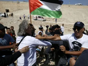 A French-American citizen and two other activists were arrested in the Bedouin village of Khan al-Ahmar. (AFP/File)